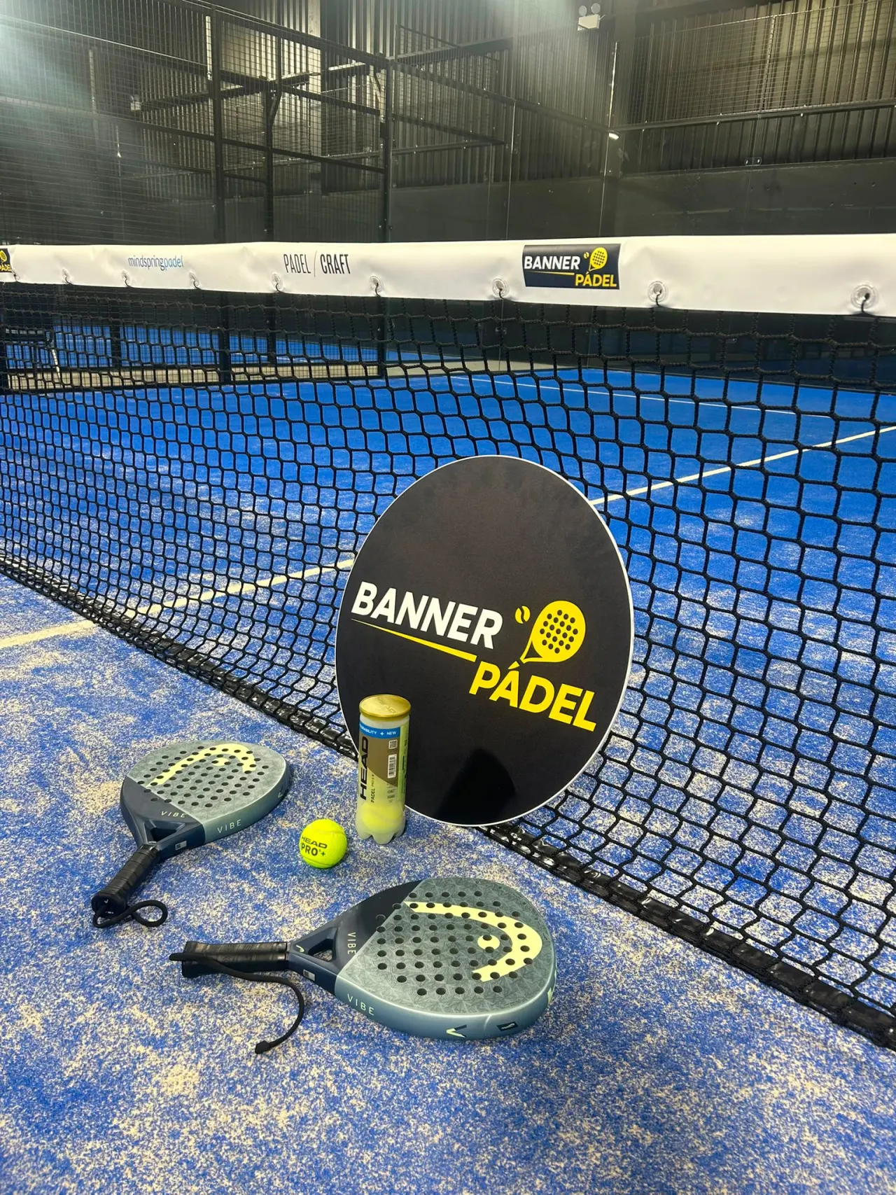 Banner Padel court in Ennis — rackets, balls and Banner Padel sign at the net